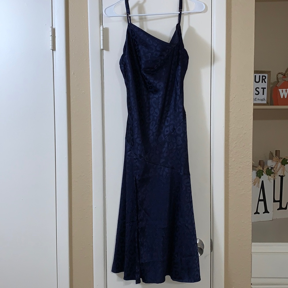 Navy blue satin dress. Design on dress is cheetah print
